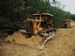 Two Caterpillar bulldozers after work.